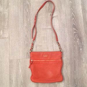Kate Spade leather orange crossbody purse.